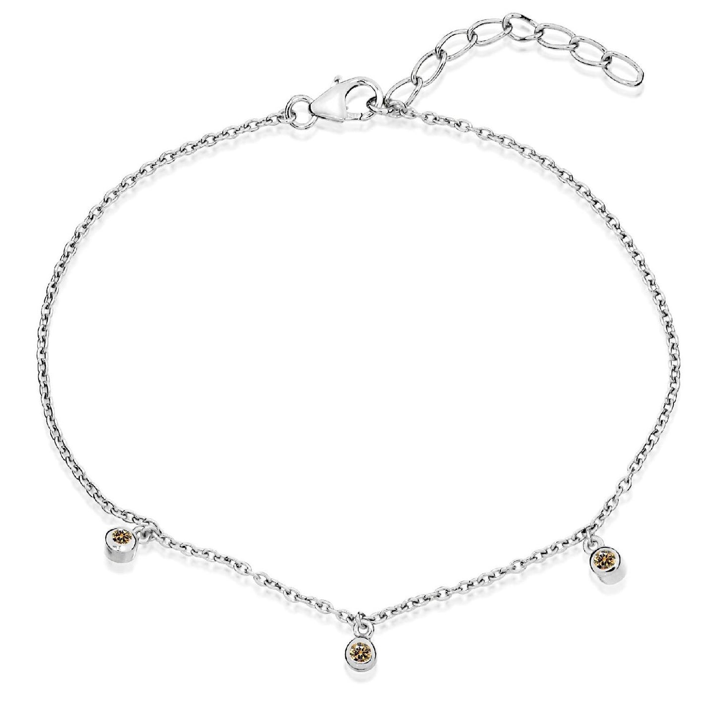 A delicate sterling silver chain bracelet with three evenly spaced champagne cubic zirconia stones and an adjustable extender.