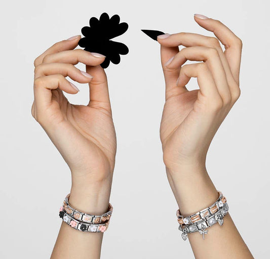 how to spot a fake nominatin charm and bracelet