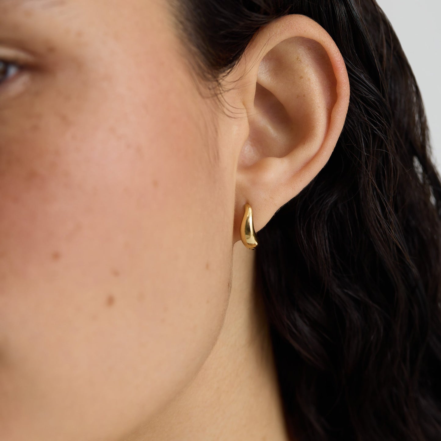 Gold Wave Huggie Hoop Earrings