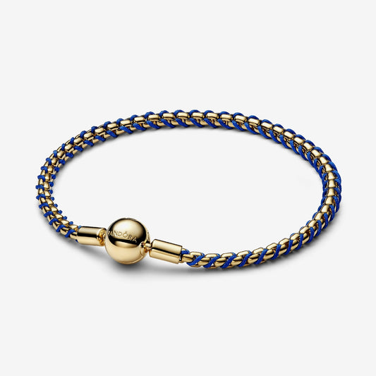 Genuine Pandora 14kt gold blend box chain bracelet intertwined with a vibrant blue cord, featuring a round logo-engraved clasp.