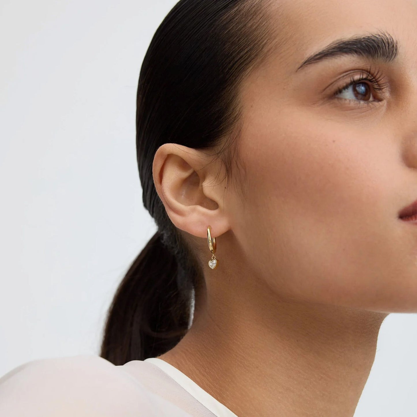 Gold Bezel Heart Huggie Earrings