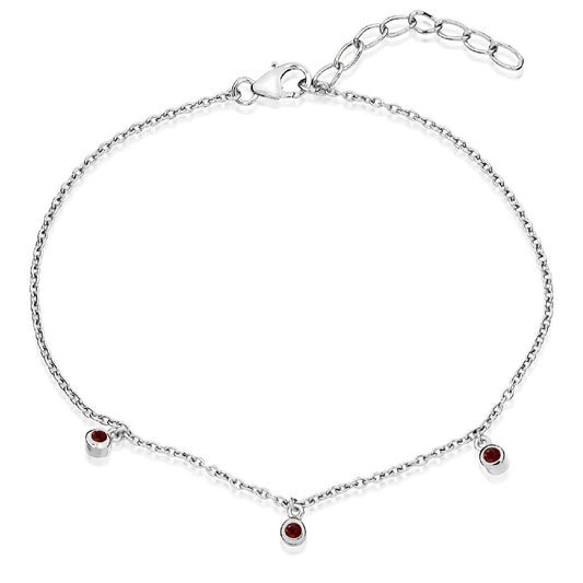 A delicate sterling silver chain bracelet featuring three evenly spaced garnet red cubic zirconia stones and an adjustable extender.