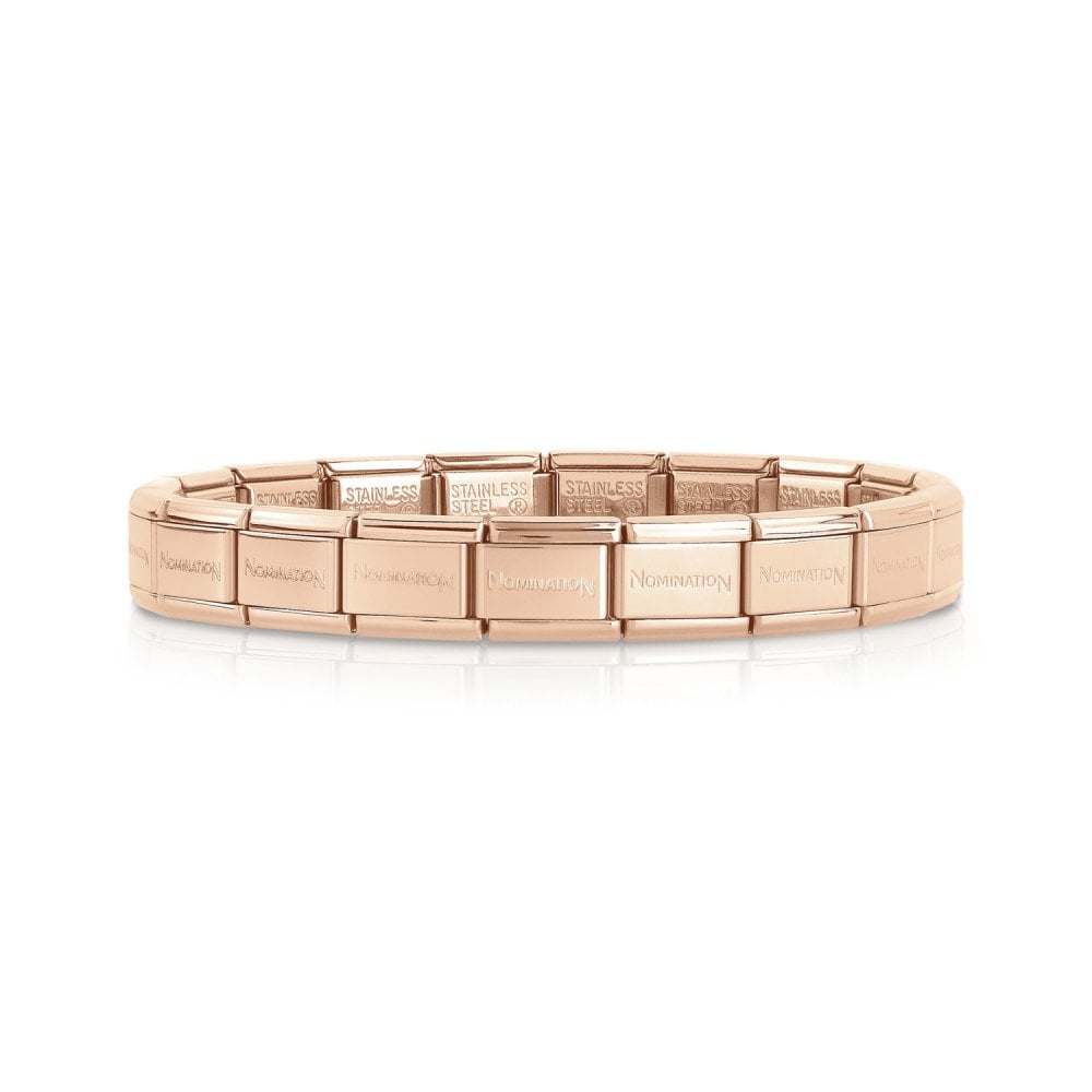Nomination rose gold-toned charm bracelet made from Composable steel links engraved with the Nomination brand name.